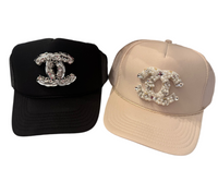 Channel inspired trucker hats